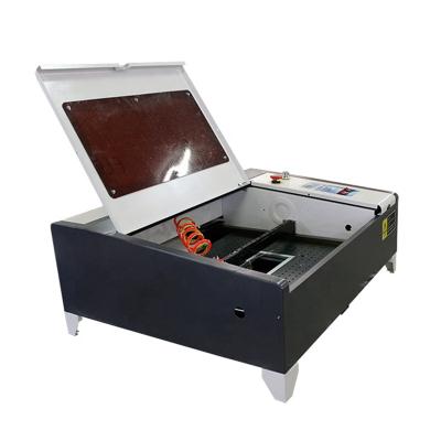 China Laser Engraving Portable Laser Engraver CO2 CNC Laser Cutting Machine DF-E4040 for sale