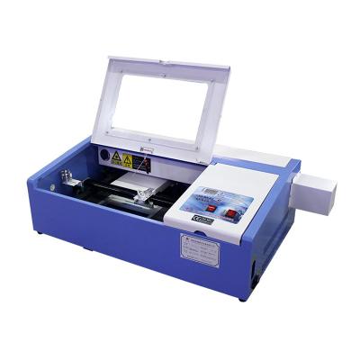 China Mini CO2 3020 40W/50W Laser Cutting Machine CNC Deep Marking Laser Engraving Machine for sale