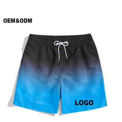 China Plus Size 2022 Fashionable Gradual Color Changing Quick Dry Men's Shorts Woven Shorts Beach Pants With Pockets for sale