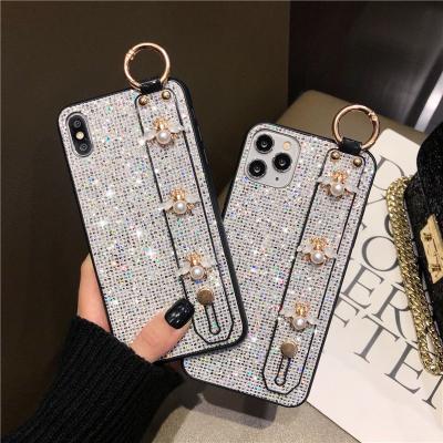 China Shockproof Luxury Bling Glitter Sequin Pearl Diamond Bee Wristband Phone Cases For iphone 13 14 Pro Max 12 11 XR 7 8 Plus Shockproof Cover for sale