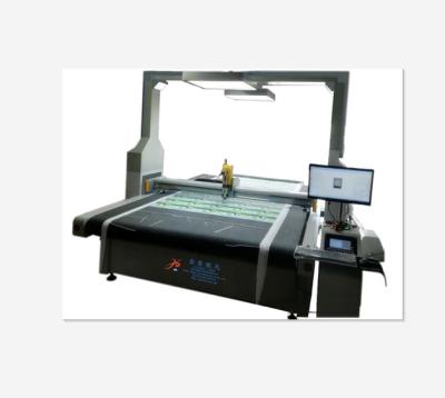 China Automated loading vision laser cutter CO2 laser cutting machine for clothes textile knife cut CCD camera vision laser cutting machine for sale