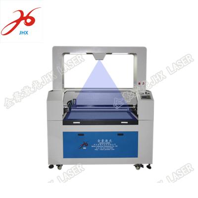 China Water Cooled Cutter and Engraving Machinery CNC Laser Cutting Machine Suitable Cloth, Leather, Wool Laser Cutter and Engraver for sale