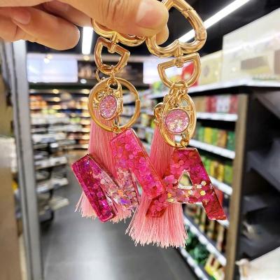 China New Fashion Promotion Gift Initial Letter Tassel Key Chain Acrylic A-Z Letter Keychain Charm Bag Couple Bag Gift for sale