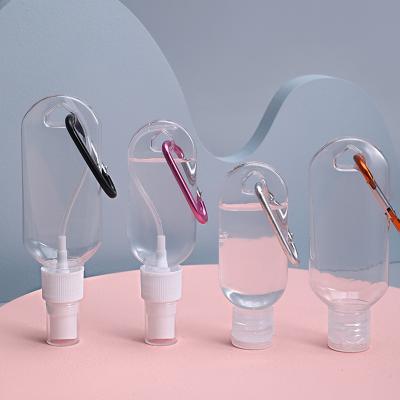 China Hand Sanitizer Bottle 30ml 50ml PET Key Ring Hanging Spray Bottle With Top Hand Sanitizer Cover Butterfly Lip Empty Bottle for sale