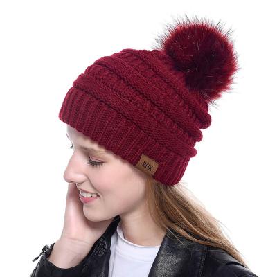 China New European and American popular acrylic hat of the COMMON 2019 women's hat fashion imitation fox fur autumn and winter woolen ball hat for sale