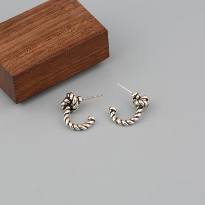 China TRENDY Vintage Distressed In Silver Stud Earrings Geometric Spiral Knotted Metal Twist Knot Stud Earring Women Fashion Accessories for sale