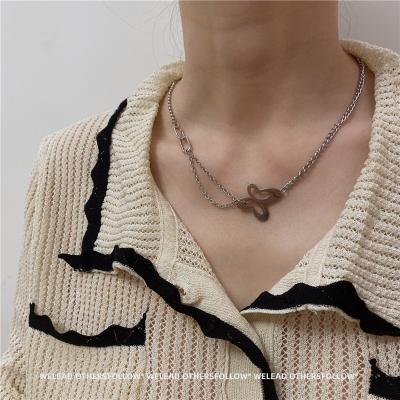 China 2021 Fashionable creative hollow steel asymmetric cool girl titanium butterfly scarves clavicle collarbone necklace link chain for sale