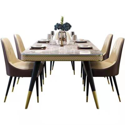 China Extendable lightweight luxury marble dining table and chair combination Nordic simple modern dining table for sale