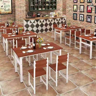 China Simple Industrial European Style Tables And Chairs For Small Restaurant Apartment Melamine Coated Wood Dining Set For 4 for sale