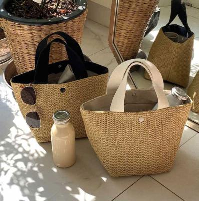 China 2022 Summer Handbag Woman Fashion Hot Selling Beach Bag Handmade Woven Straw for sale