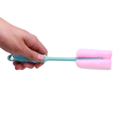 China Sustainable Portable Personality Sponge Dish Wash Bottle Cleaning Brush With Handle for sale