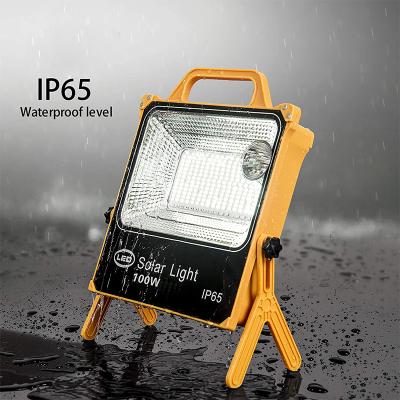 China 100W 2021 Outdoor Portable Solar Flood Lighting Flood Light Charger 18000mAh Solar Waterproof Portable Mine Spotlight for sale