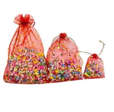 China Beautiful Christmas Large Cheap Unique Shopping Glitter Color Snowflake Candy Jewelry Gift Organza Bags for sale