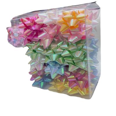 China Hot Selling Iridescent Colorful Star Bow Diameter Colorful Floral Bow Making Machine PP Solid Ribbon Plastic Gift Wrap for sale