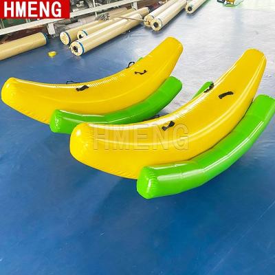 China Kids Play Pirates Center Rocking Custom Inflatable Banana Water Seesaw Rocking Games Pirate Ship Water Seesaw Bouncer Climbing Games for sale