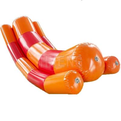 China Children Play Central Hot Selling Inflatable Water To Rock Funny Games Inflatable Water Teeterboard Water Seesaw Toys for sale