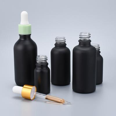 China 5ml 10ml 20ml 30ml 50ml 100ml 120ml Matte Frosted Black Glass Dropper Bottle Essential Oil Bottles for sale