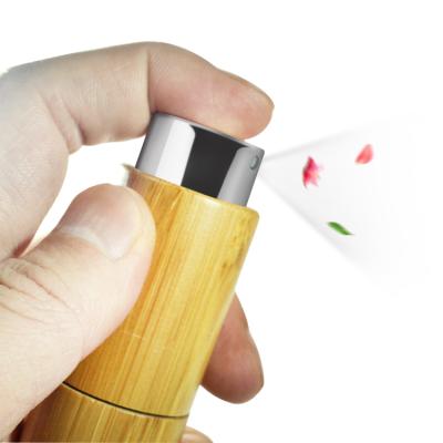 China 10ml bamboo perfume bottles with sprayer engraving logo customized for sale