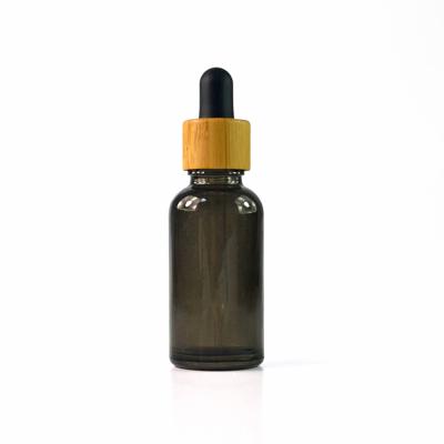 Chine 20ml e liquid black frosted glass dropper bottle with bamboo and glass pipette à vendre