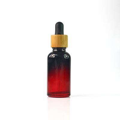 China hot sale e liquid essential oil red 15ml 30ml bamboo lid glass dropper bottle for sale