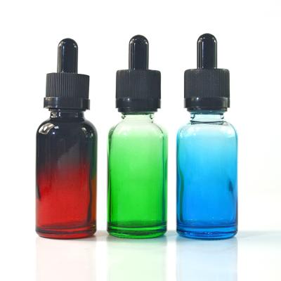 Chine hot sale essential oil 10ml red blue green gradient color glass dropper bottle à vendre