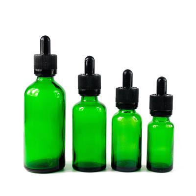 China Hot sale dark green 15ml 20ml 30ml 50ml glass olive oil dropper bottle with rubber pipette for sale