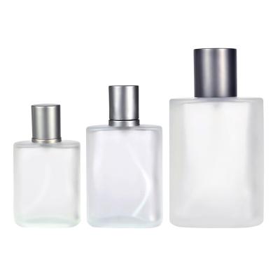 China Hot sale 30ml 50ml 100ml glass mist spray Perfume bottle with sliver aluminum cap for sale