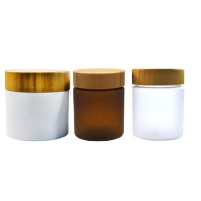 China Bamboo cosmetic 20g 30g 50g 100g 150g 250g PP PET plastic skin care cream jar with bamboo cap for sale