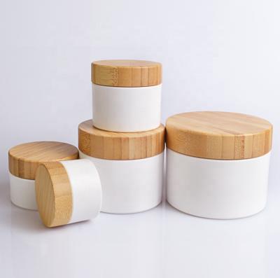 Chine Luxury cosmetic 20g 30g 50g 100g 150g PP plastic skin care cream jar with bamboo wood cap à vendre