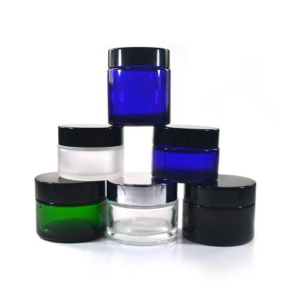 China Skin care blue amber clear green 15g 30g 50g 2 oz cream cosmetic glass jar with lid for sale