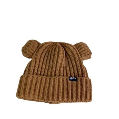 China COMMON 2805 Cute Small Bear Ears Big Loose Knitted Hat Women's Winter Thickened Warm Plain Beanies for sale