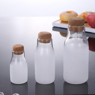 China Healthy Material Frosted Glass Jar With Cork Lids Frosted Clear Glass Jar Bottles With Cork Lids for sale