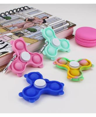 China Metal Push It Push Button Single Flip Toy Spinner Finger Spinner Bouncy Person Spinner Toys for sale