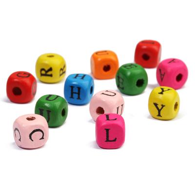 China 100pcs/bag Other Wholesale Colorful Alphabet Letter Beads 10mm Wooden Spacer Beads For Jewelry Making for sale