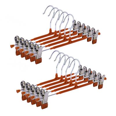 China Customized Hanger Nano Material Customized Floating Seamless Pants Racks Metal Pant Hangers With Clips for sale