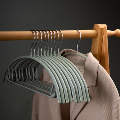 China Custom Nordic Light Material Eco-friendly Traceless Household Bedroom Hangers Creative Luxury Non Slip Hangers for sale