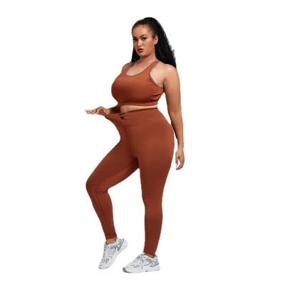 China Breathable New Yoga Suit Women's Sports Suit Plus Size Sweat Tight Fitness Suit Two Sets for sale