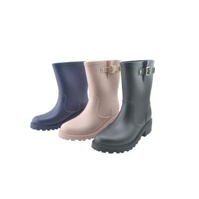 China Fashion trend cool buckle side middle cut rainboots women ladies waterproof rain boots for sale