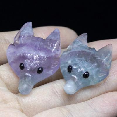 China China popular wholesale crystal carving animal natural fluorite wolf head healing crystals for home decoration for sale