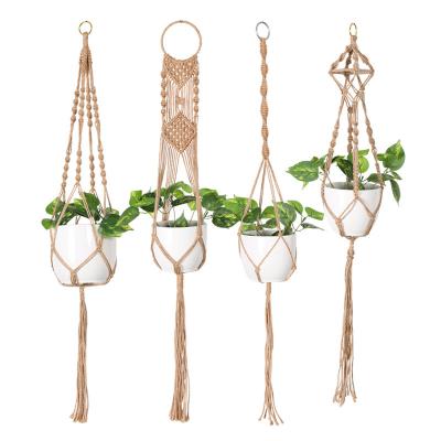 China Handmade Jute Macrame Plant Pot Hanging Indoor Woven Baskets Hanging Plant Hanger with Hook Wall Hanging Planter for sale