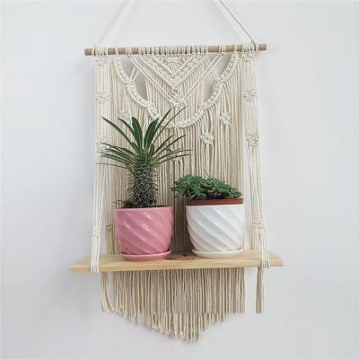 China Macrame Wall Hangers Plant Pot Basket Tapestry Wall Hanging Handmade Handmade Shelf Woven Macrame Wall Hanging for sale