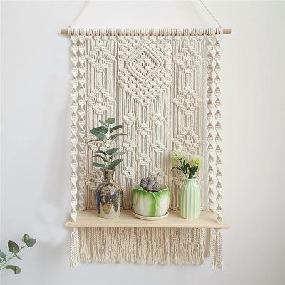 China Cotton Macrame Wall Hanging Shelf Home Decor Macrame Wall Hanging Bohemian Tapestry With Shelf for sale