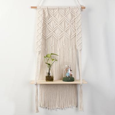 China Handmade Bohemian Cotton Woven Plant Wall Hangers Plant Pot Basket Wall Tapestry Cotton Macrame Wall Hanging Shelf for sale