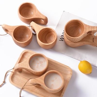 China Sustainable Wooden Milk Tea Coffee Beer Mug With Handle Nordic Style Finland Wooden Mug For Camping Hiking for sale