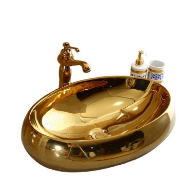 China Ceramic Oval Sink Art Basin Gold Wash Basin Modern Bathroom Sink Gold Basin For Bathroom for sale