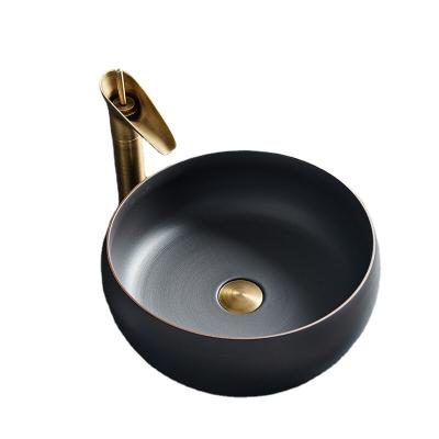 China Art Ceramic Counter Basin Single Household Toilet Anti-puddle Black Wash Basin Viable Antique Sink for sale