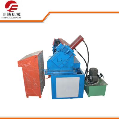 China Galvanized Steel Roller Shutter Door Roll Forming Machine With Hydraulic Cutter for sale