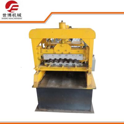 China Hydraulic Cutting Type Roller Shutter Door Forming Machine With Punching Holes for sale