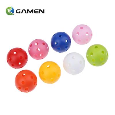 China Golf Practice GAMEN Multi Color Outdoor Practice 26 Holes Air Flow Volume Shaping Mini Plastic Hollow Golf Ball for sale