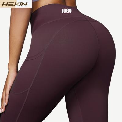 China HEXIN Women's Breathable Sportswear High Waist Leggings With Pockets Women's Fitness Yoga Leggings for sale